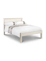 Julian Bowen Barcelona stone white bed made up with white bedding, on a white background