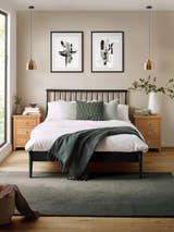 Julian Bowen Belton spindle bed in black oak effect, in a bedroom