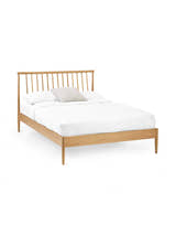 Julian Bowen Belton oak spindle bed on a white background