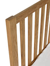 Coxmoor bed: top rail and slats of the oak headboard, close up