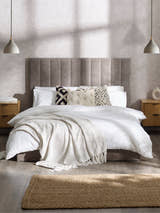 Julian Bowen Eloise grey chenille bed with a tall panelled headboard, in a bedroom