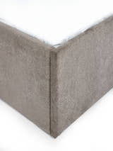 Eloise bed: upholstered corner of the grey chenille base, close up