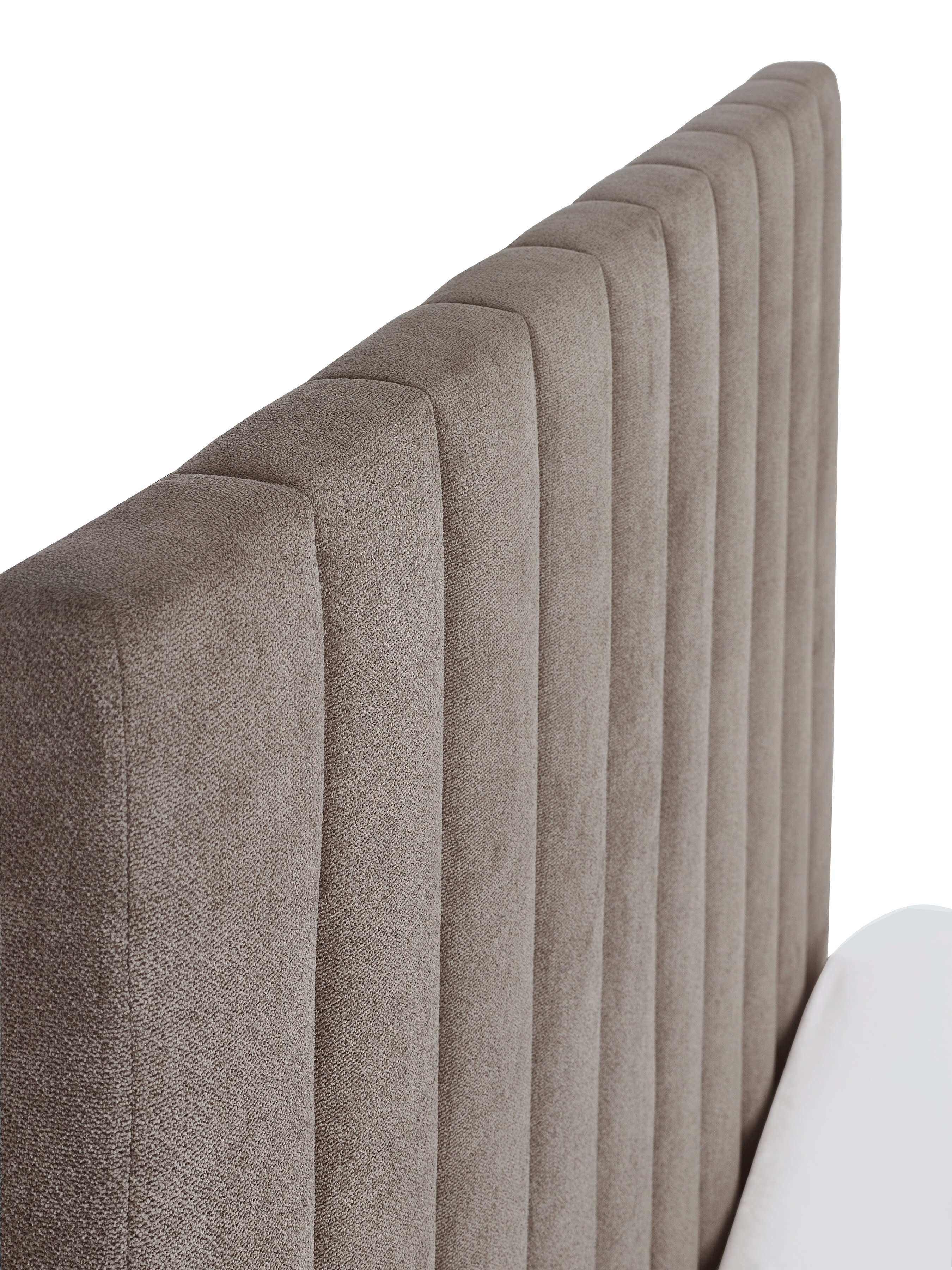 Eloise bed: side of the headboard padded in vertical panels, close up