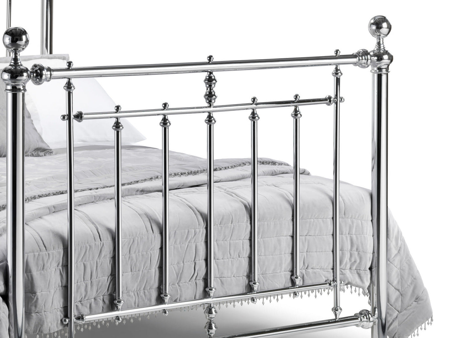 Julian Bowen Empress chrome footboard with ball finial posts and decorative collars, close up