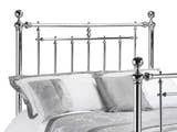 Julian Bowen Empress chrome headboard with ball finials and turned spindles, close up