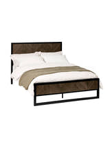 Julian Bowen Harrison black and dark oak herringbone bed made up, on a white background
