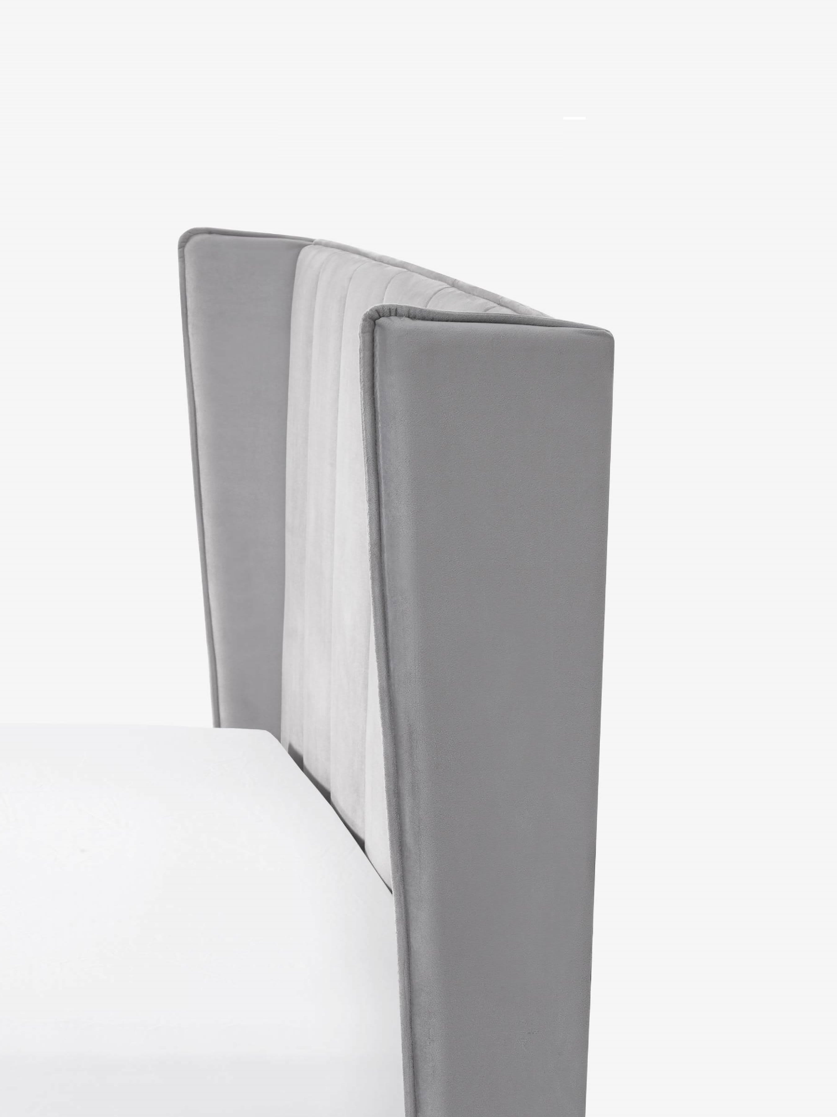 Katie bed: headboard wing beside the mattress, close up