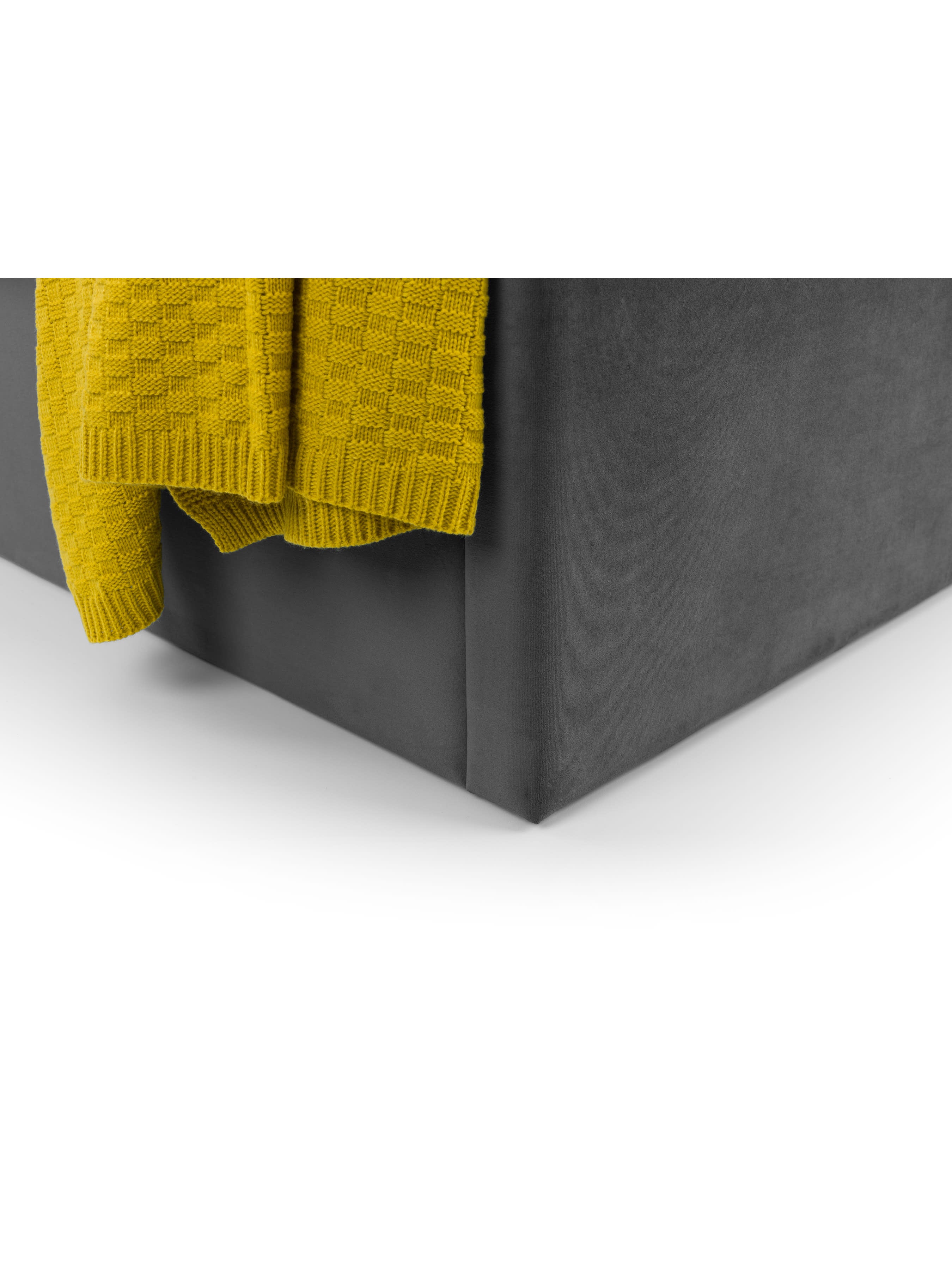 Langham bed: corner of the grey velvet base, close up