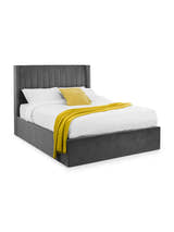Julian Bowen Langham grey velvet ottoman bed made up with bedding, on a white background