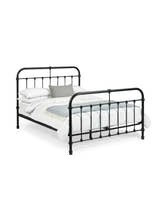 Julian Bowen Logan black metal bed made up with bedding, on a white background