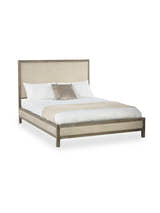 Julian Bowen Lucie oatmeal linen and limed oak bed made up with bedding, on a white background
