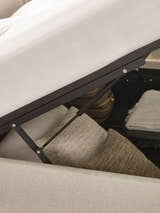 Maddock ottoman bed: lift mechanism above stored cushions, close up