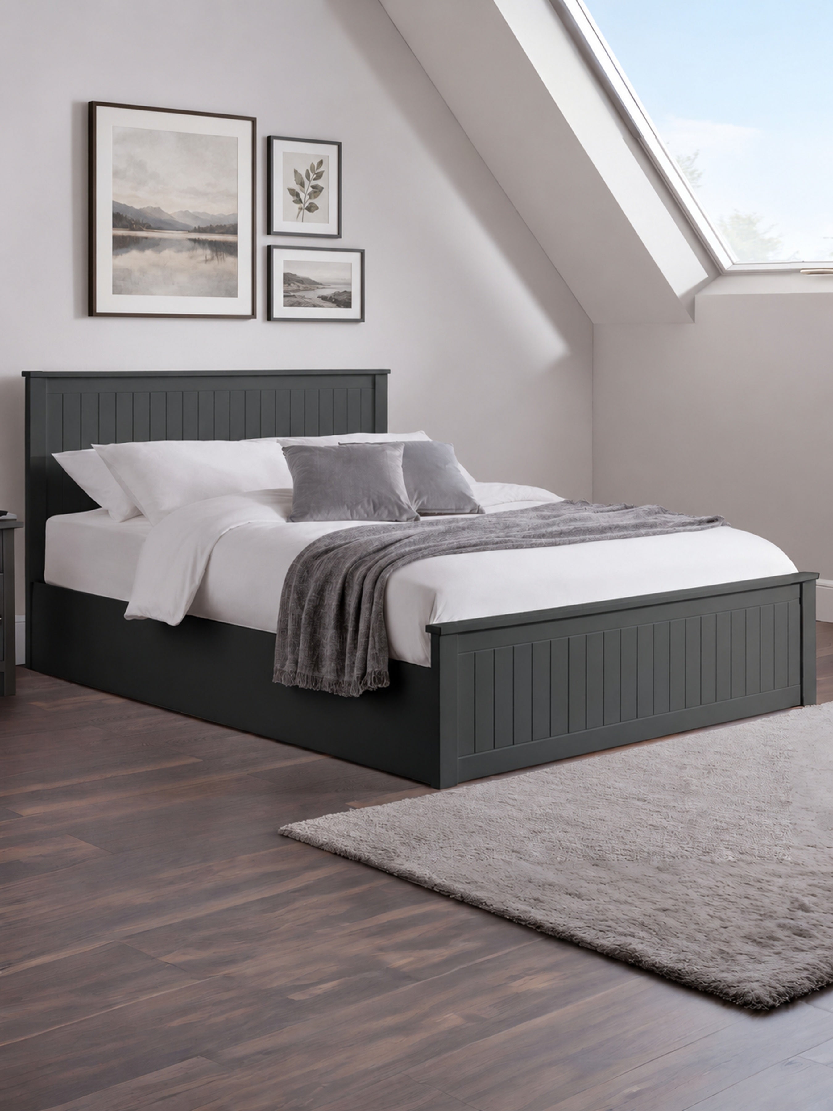 Julian Bowen Maine ottoman bed in anthracite, made up in a loft bedroom