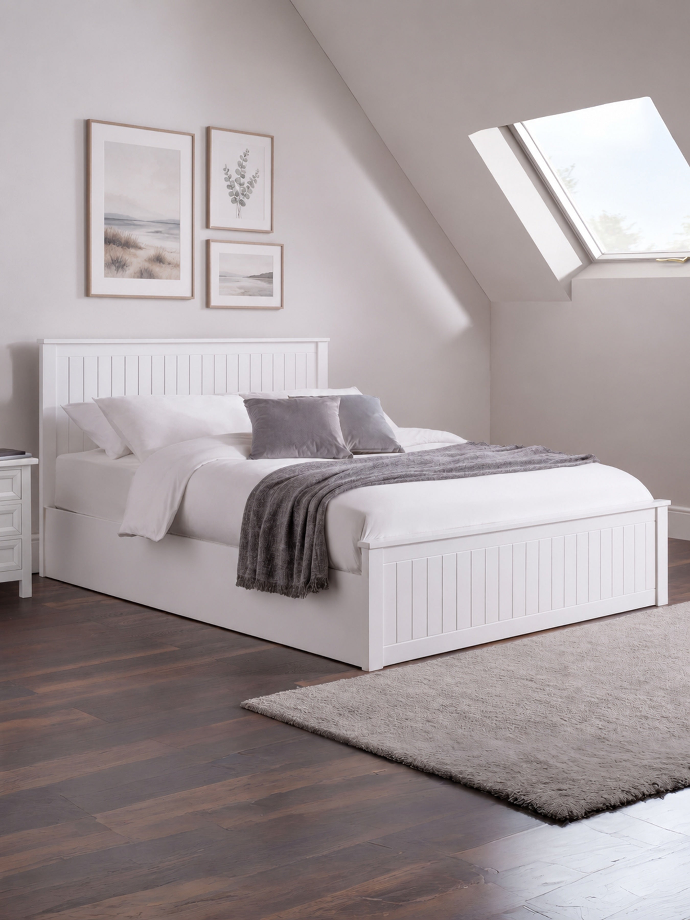 Julian Bowen Maine ottoman bed in surf white, made up in a loft bedroom