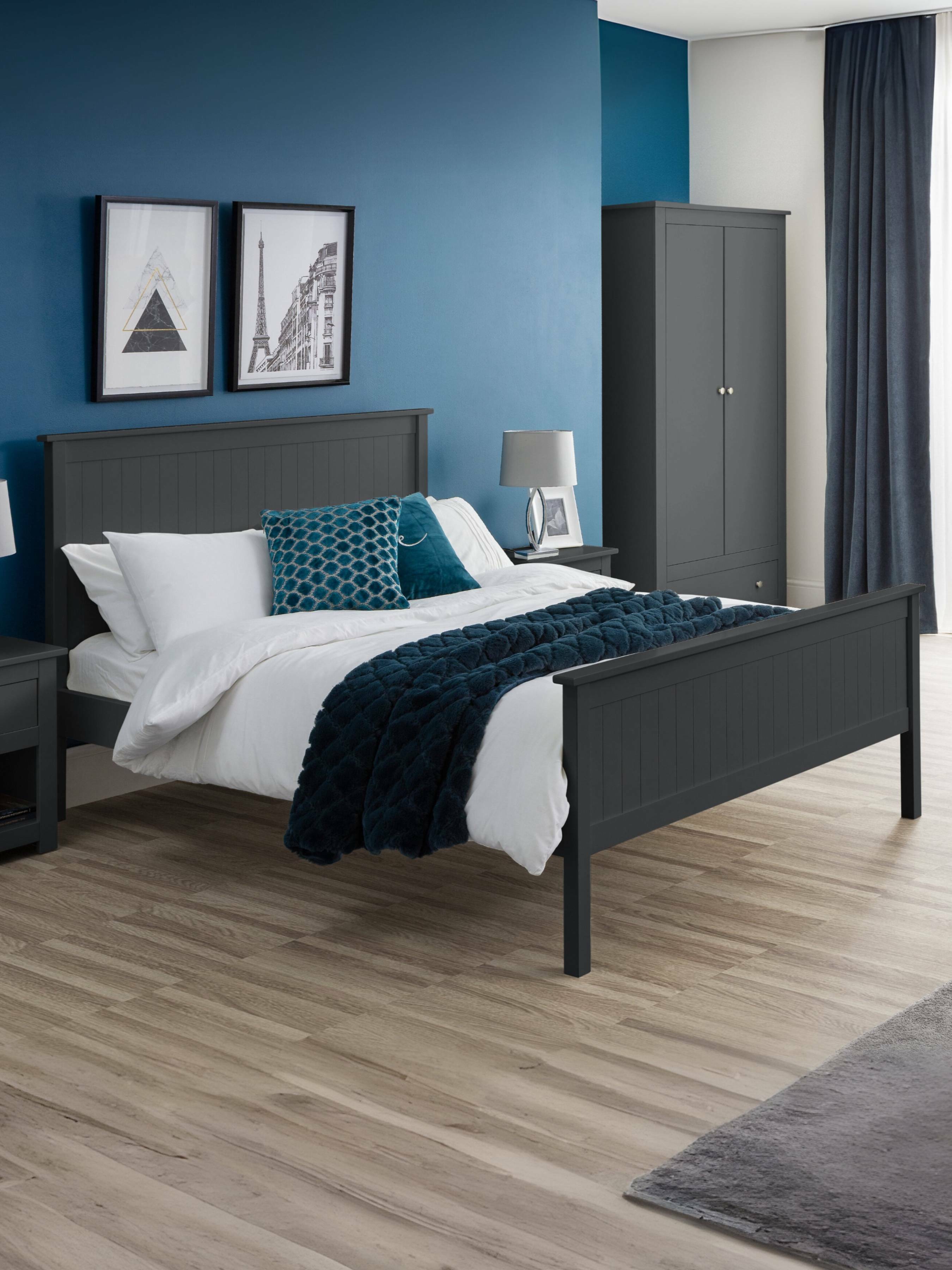 Julian Bowen Maine bed in anthracite, in a bedroom with a blue wall
