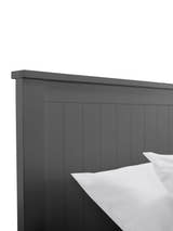 Maine bed: the top of the anthracite panelled headboard, close up