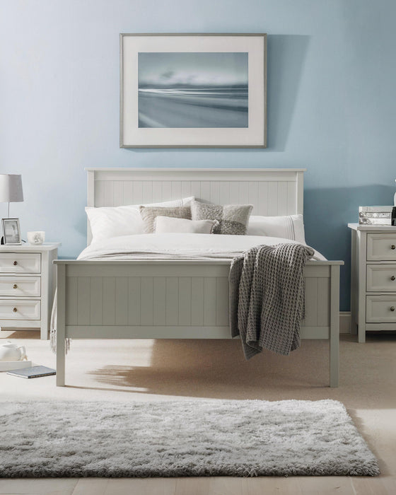 Julian Bowen Maine bed in dove grey, in a bedroom with blue walls