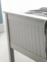 Maine bed: the dove grey footboard with vertical detailing, close up