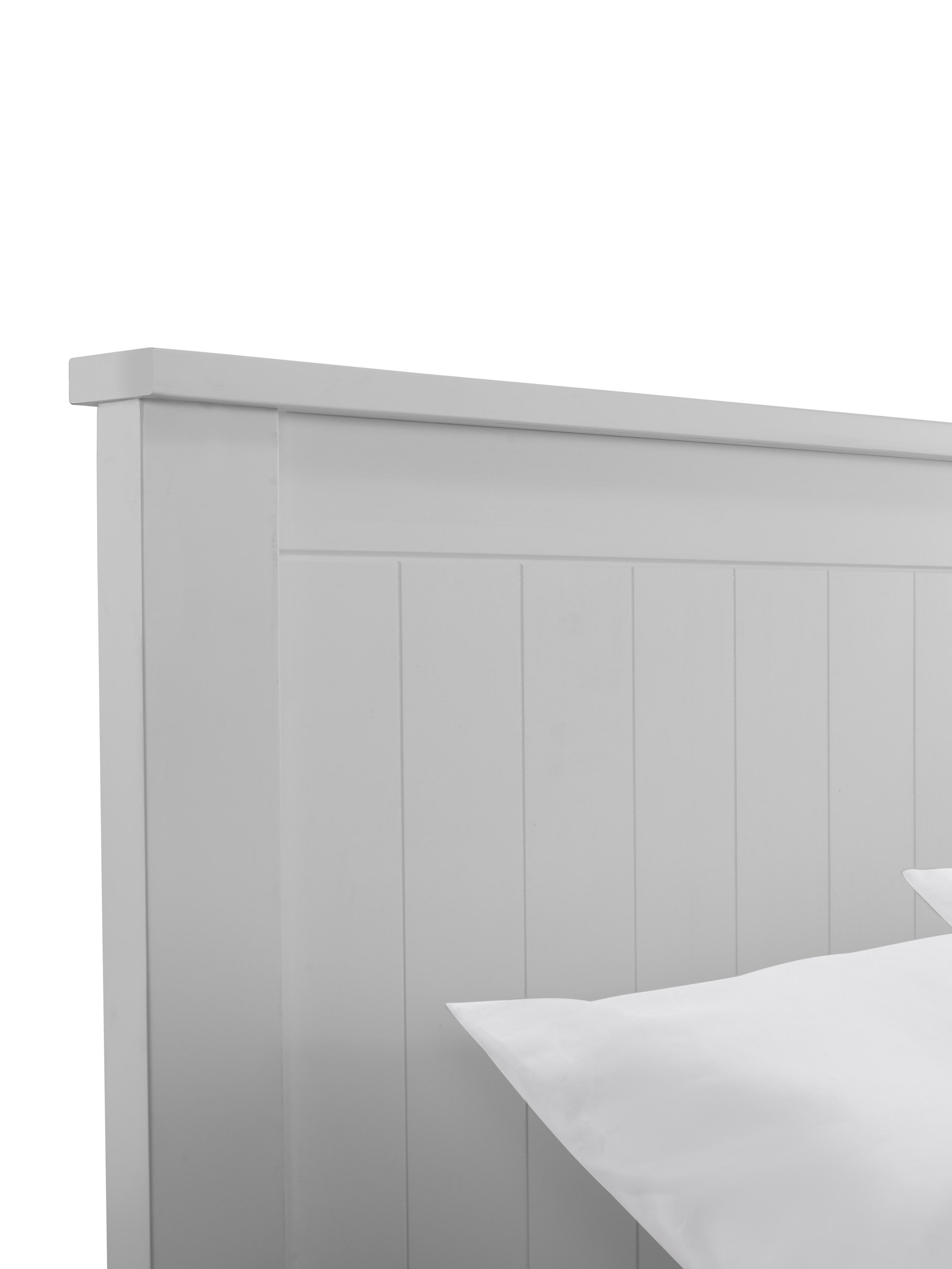 Maine bed: the top of the dove grey panelled headboard, close up
