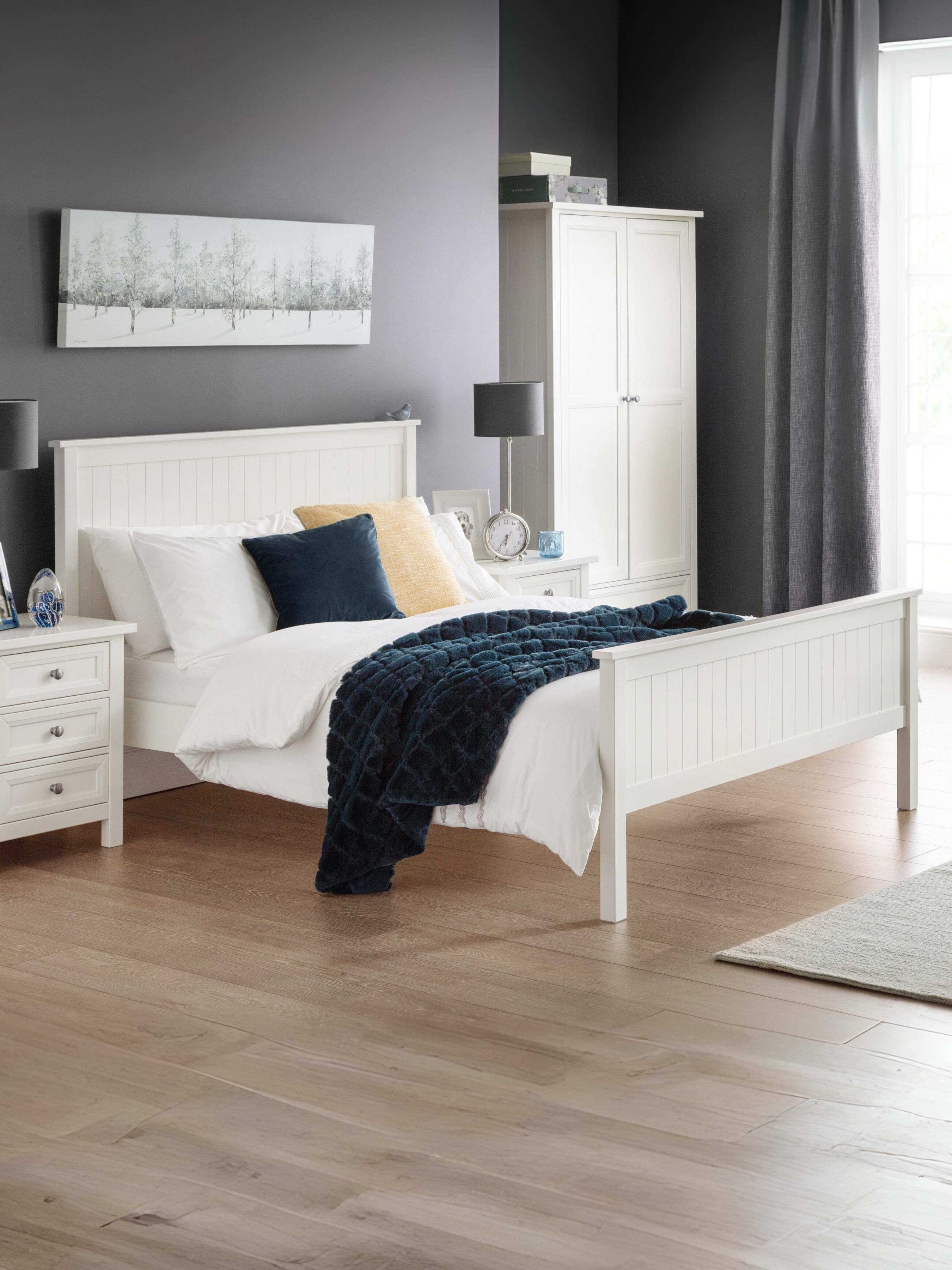 Julian Bowen Maine surf white bed in a bedroom with a grey wall