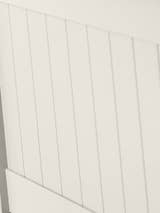 Maine bed: the vertical panelling in surf white, close up