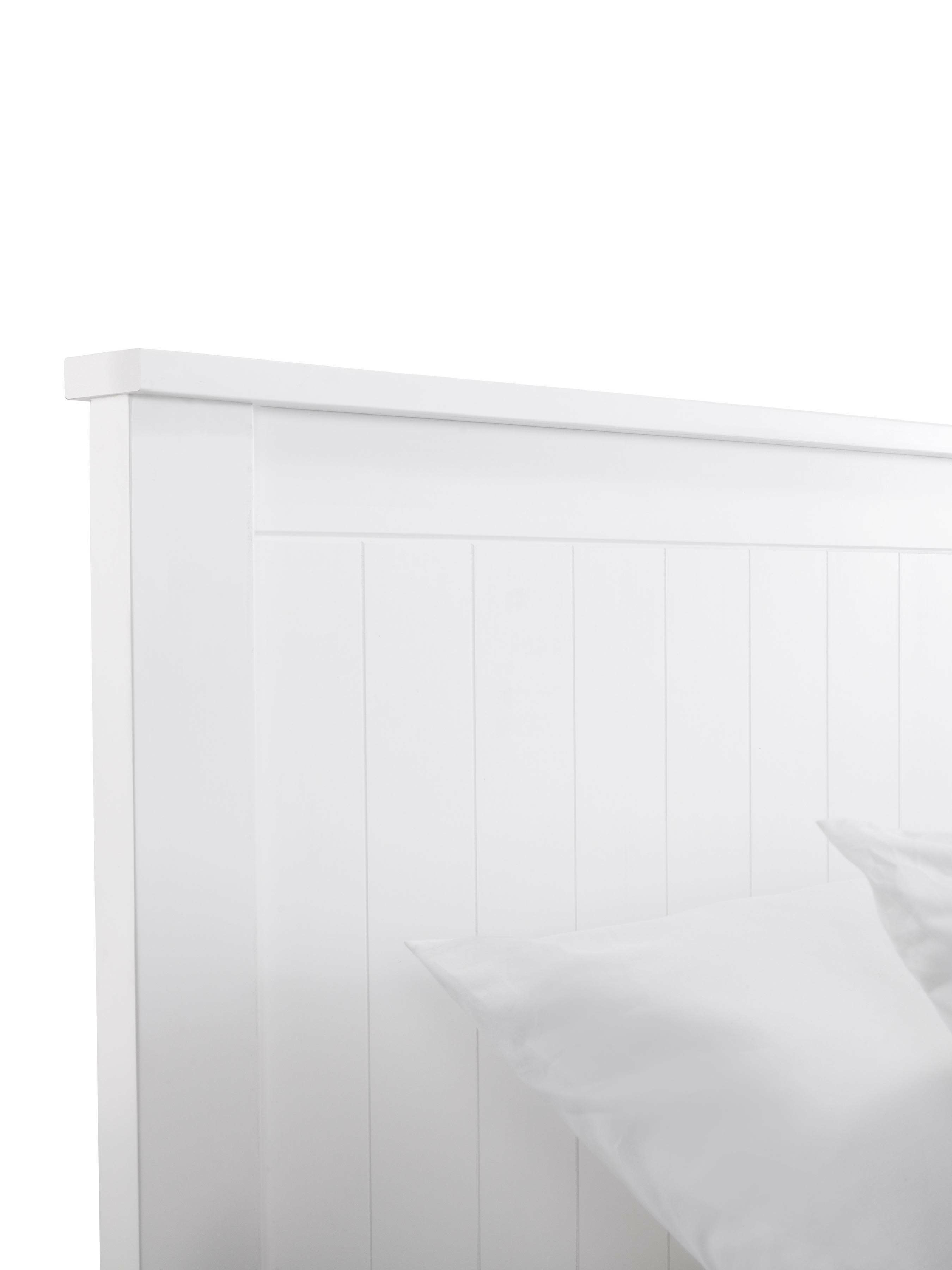 Maine bed: the top of the surf white panelled headboard, close up
