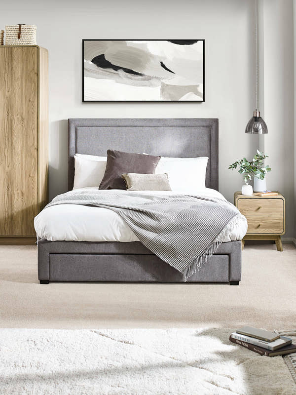 Julian Bowen Mayfair 4 drawer storage bed in grey linen style fabric, in a bedroom