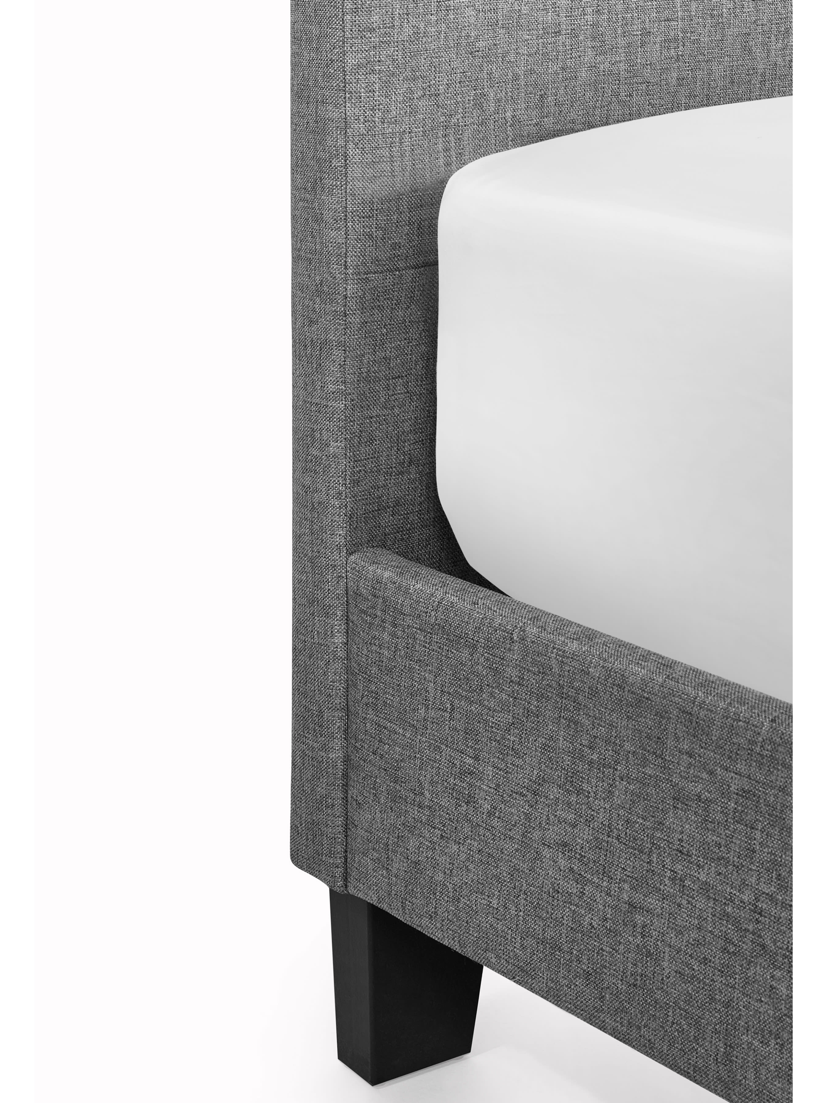 Merida bed: corner of the grey base and its dark foot, close up