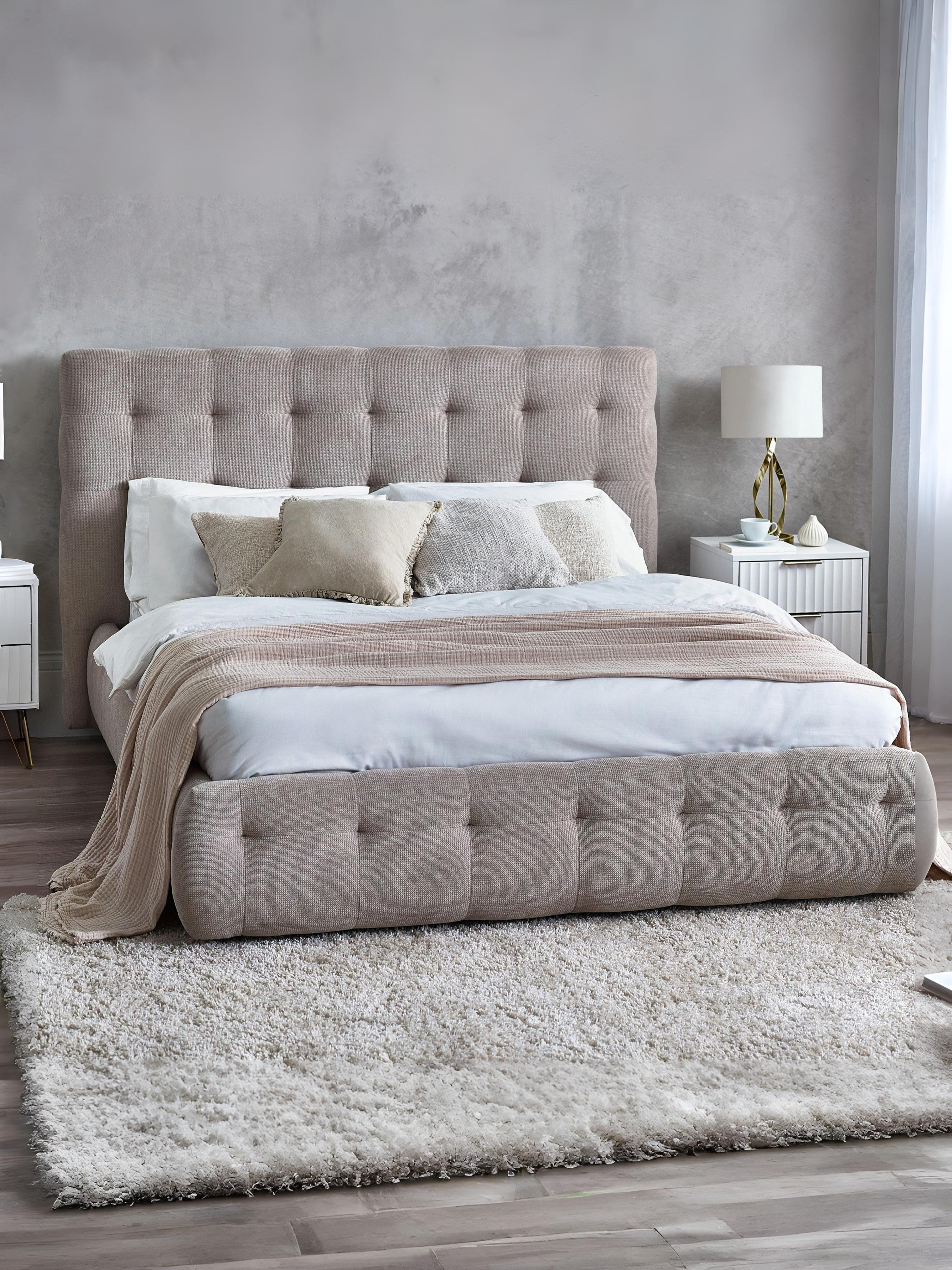 Julian Bowen Odette light taupe bed with a buttoned headboard and footboard, in a bedroom