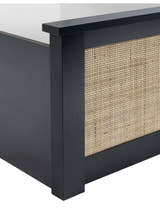 Padstow ottoman bed: corner of the black frame and rattan panel, close up