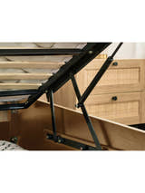 Padstow ottoman bed: gas struts of the raised base over the storage, close up