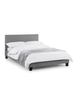 Julian Bowen Rialto grey linen bed made up with white bedding, on a white background