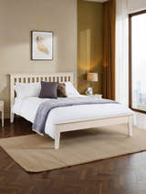 Julian Bowen Salerno shaker bed in ivory, in a bedroom with a herringbone floor