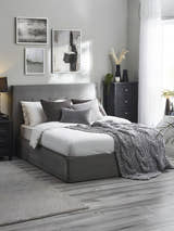 Julian Bowen Shoreditch ottoman bed in slate grey, made up in a bedroom
