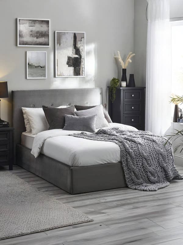 Julian Bowen Shoreditch ottoman bed in slate grey, made up in a bedroom