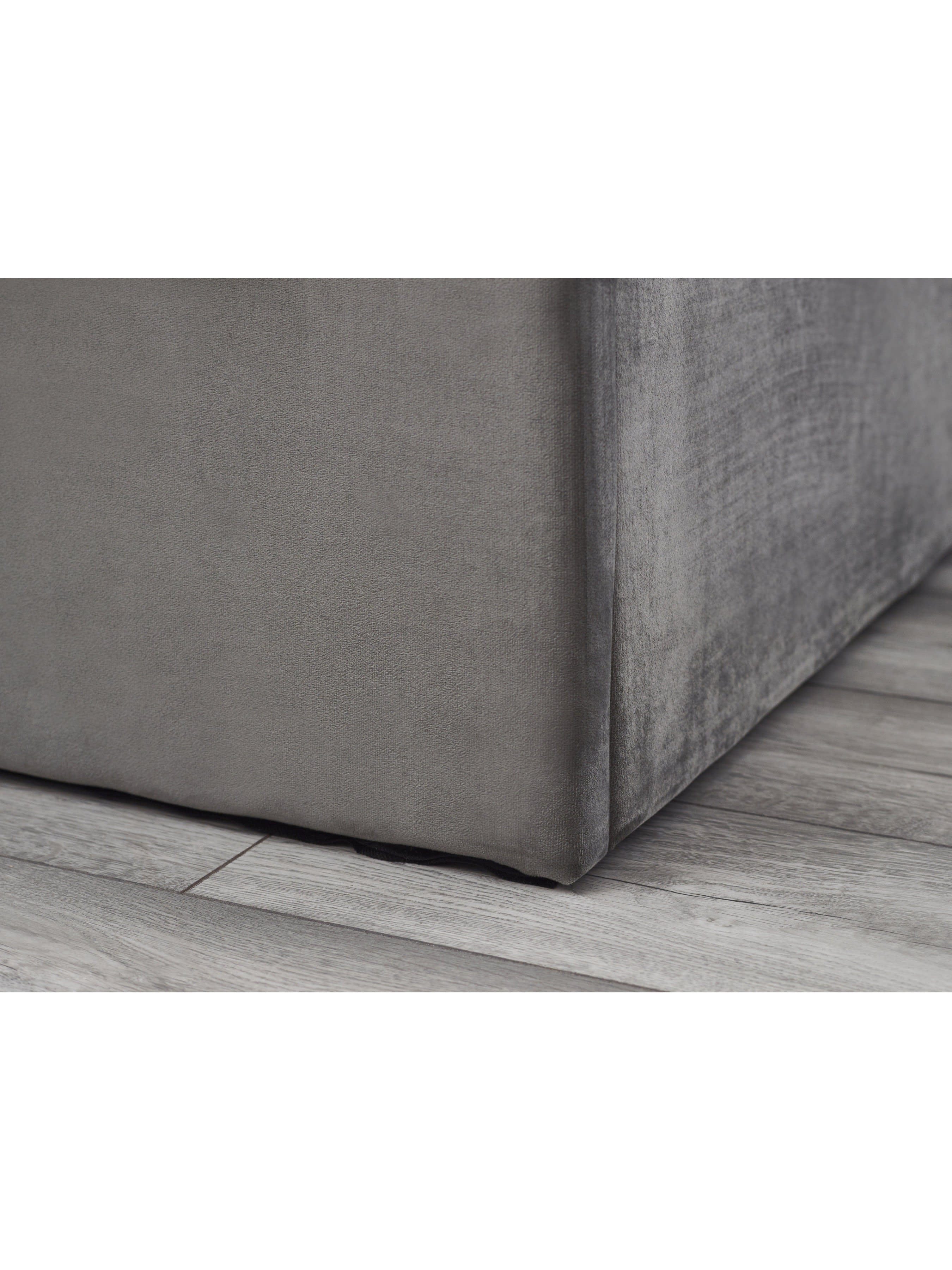 Shoreditch ottoman bed: corner of the slate grey upholstered base, close up