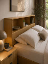 Sia bed: open shelves and fluted panel of the bookcase headboard, close up