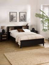 Julian Bowen Sydney bookcase bed in black ash effect, in a bright bedroom