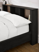 Sydney bed: black ash effect bookcase headboard beside the pillows, close up