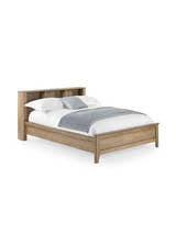 Julian Bowen Sydney oak effect bookcase bed made up, on a white background