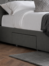 Wilton bed: a drawer on the side of the dark grey base, close up