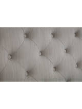 Wilton bed: deep buttoning on the light grey headboard, close up