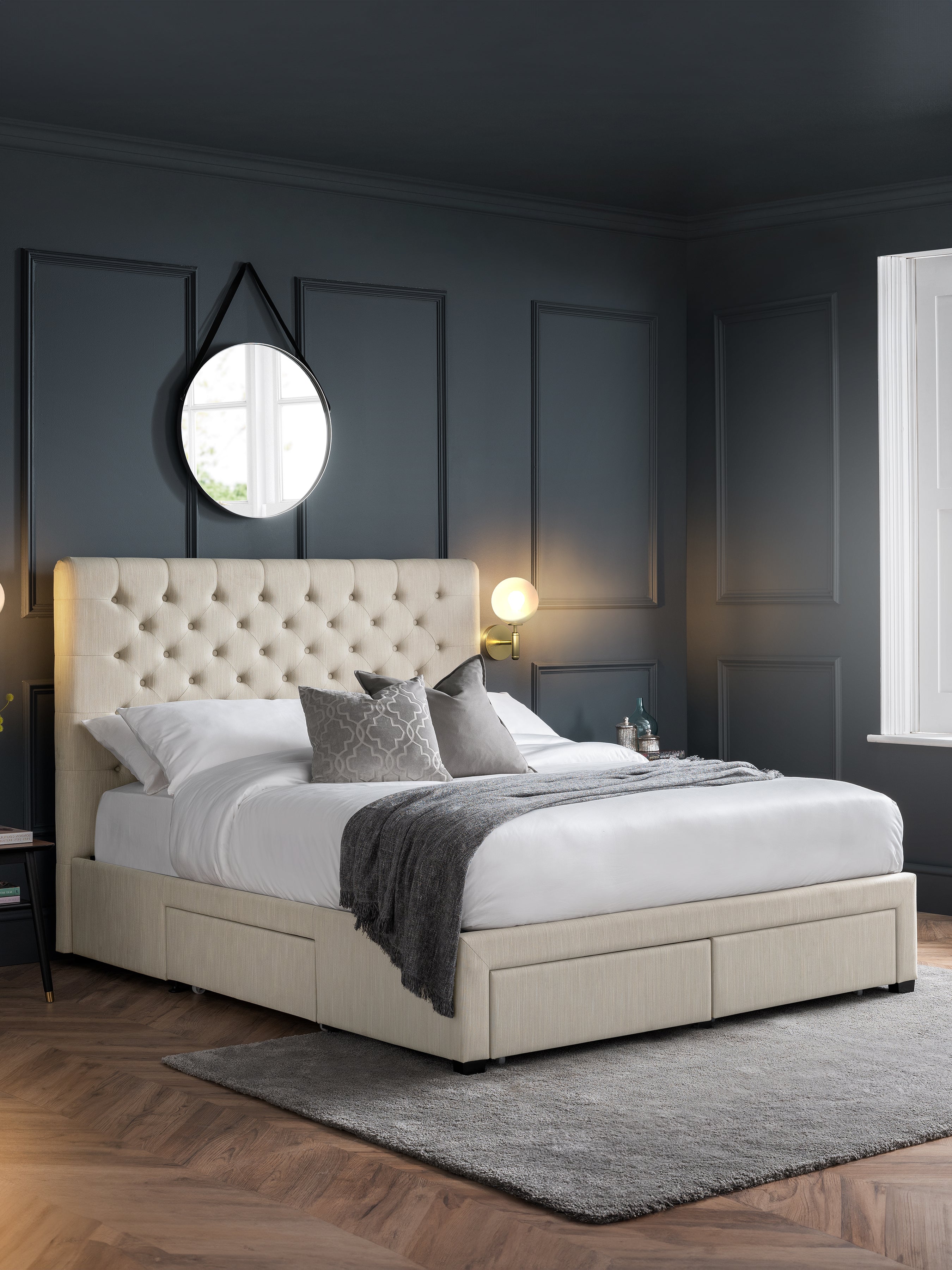 Julian Bowen Wilton 4 drawer bed in oatmeal, in a dark panelled bedroom