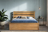 Hampton solid oak ottoman bed, natural finish, with the storage closed