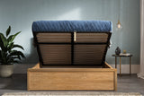 Hampton solid oak ottoman bed, natural finish, storage open, seen from the side