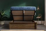 Kingston solid oak ottoman bed, medium oak finish, with the gas lift storage open