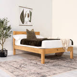 Mortlake wooden bed in solid oak, light finish