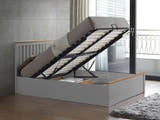 Ruislip wooden ottoman bed in pearl grey, with the gas lift storage open