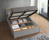 Ruislip wooden ottoman bed in pearl grey, storage open, showing the three sections