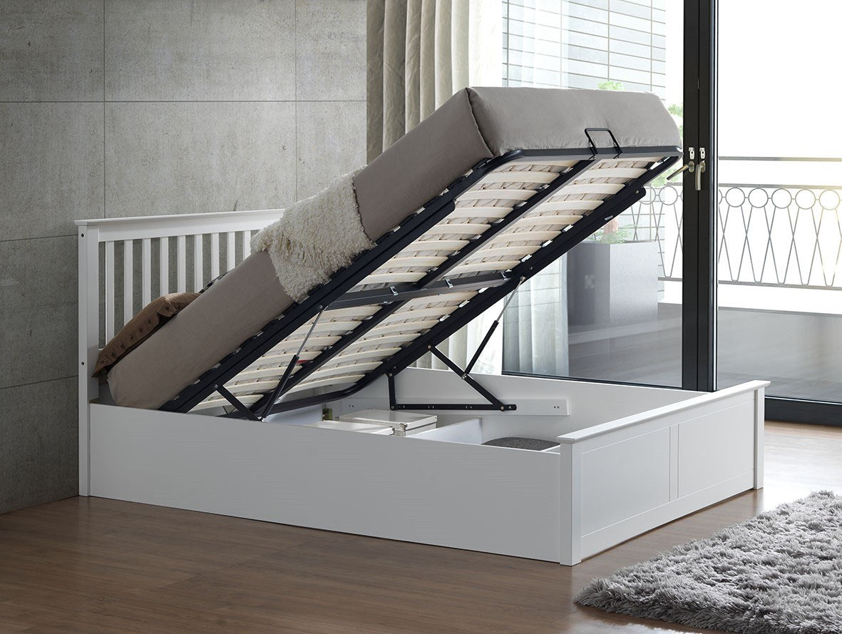 Ruislip wooden ottoman bed in white, with the gas lift storage open